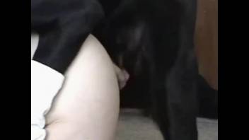 Rear-entry banging clip featuring a busty animal sex fanatic